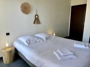 Posteľ alebo postele v izbe v ubytovaní le Pied à Terre 2 PORTICCIO