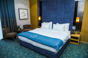 Postel nebo postele na pokoji v ubytování Iris Hotel Baku - Halal Hotel
