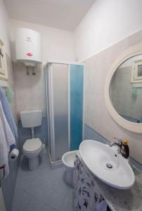 Ванна кімната в Bilocale con ampio terrazzo