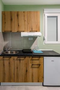 O bucătărie sau chicinetă la Đerdan Garden apartments