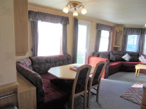 Un lugar para sentarse en 10 Berth on Coastfields with free WiFi Status
