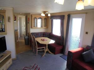 Un lugar para sentarse en 10 Berth on Coastfields with free WiFi Status