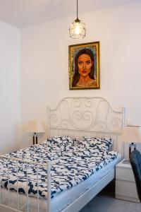 Кровать или кровати в номере Family&Friends Apartments Schönbrunn