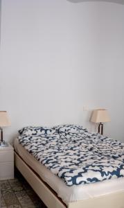 Кровать или кровати в номере Family&Friends Apartments Schönbrunn