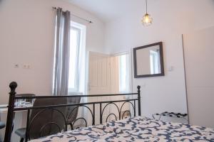 Кровать или кровати в номере Family&Friends Apartments Schönbrunn