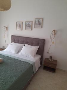 Postel nebo postele na pokoji v ubytování Giotouli Apartment