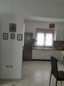 Kuchyň nebo kuchyňský kout v ubytování Giotouli Apartment