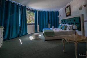Voodi või voodid majutusasutuse Hôtel ZIRYAB toas