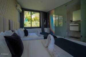 Voodi või voodid majutusasutuse Hôtel ZIRYAB toas