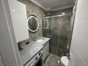 Koupelna v ubytování Rose Plus Residence