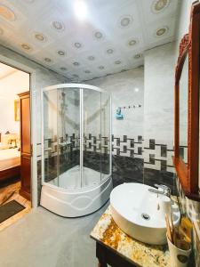 Phòng tắm tại Thành Long Hotel Ha Long