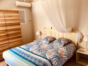 Postel nebo postele na pokoji v ubytování Maison Latecoere avec piscine + 10 fotografií