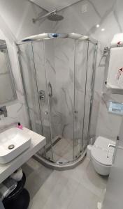 Ванна кімната в Knossos Hotel