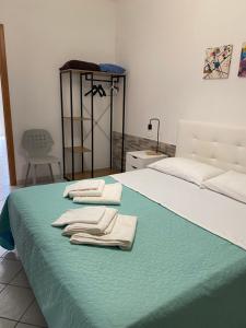 Postel nebo postele na pokoji v ubytování Casa vacanza Scala dei Turchi