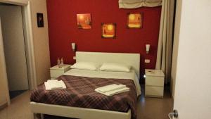 Postel nebo postele na pokoji v ubytování B&B Caffè
