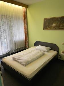 Postel nebo postele na pokoji v ubytování Hotel Kull von Schmidsfelden
