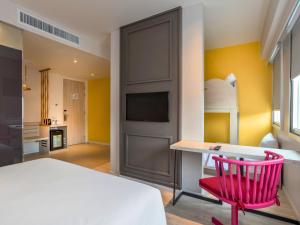 Postel nebo postele na pokoji v ubytování Ibis Styles Phuket City