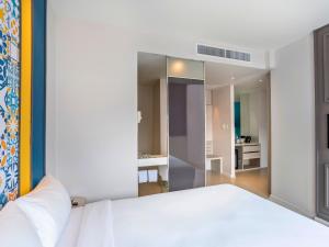 Postel nebo postele na pokoji v ubytování Ibis Styles Phuket City