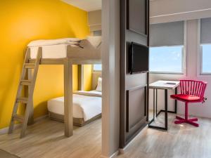 Postel nebo postele na pokoji v ubytování Ibis Styles Phuket City