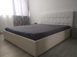 a large bed in a bedroom with a large mattress at Casa vacanze Venere in Balestrate