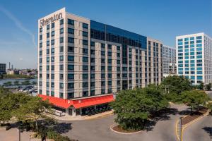 an aerial view of a large office building at Sheraton Lincoln Harbor Hotel in Weehawken