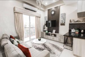 Χώρος καθιστικού στο Rosecan’s Place 4 @ Spaniada Residence Cebu City