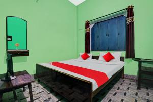 Cama ou camas em um quarto em Flagship Hotel Elvis Guest House