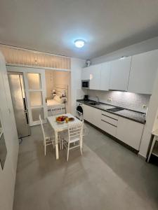 Kuchyňa alebo kuchynka v ubytovaní Home Boutique Cervantes