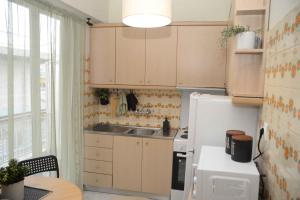 A kitchen or kitchenette at Hara's Apartment
