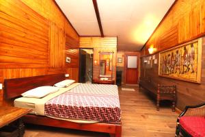 Postel nebo postele na pokoji v ubytování De Rock Jungle Living Resort