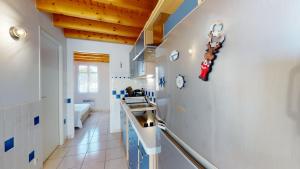 Kuchnia lub aneks kuchenny w obiekcie Le Repos de la Mer 900 m plage