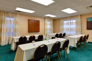 a conference room with tables and chairs in it at Residence Inn Chicago Southeast/Hammond, IN in Hammond