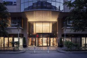 a large building with a large glass door at Prague Marriott Hotel in Prague