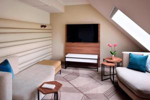 Posezení v ubytování Prague Marriott Hotel