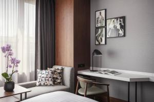 Postel nebo postele na pokoji v ubytování Prague Marriott Hotel