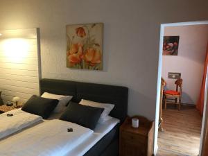Postel nebo postele na pokoji v ubytování Hotel Schachten