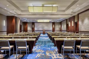 a large room with rows of tables and chairs at The Westin Memphis Beale Street in Memphis