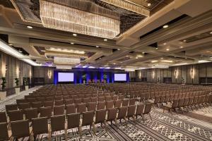 an empty banquet hall with chairs and screens at Sheraton Grand Los Angeles in Los Angeles +37 photos