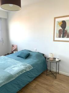 Postel nebo postele na pokoji v ubytování La Petite Case - Face Mer