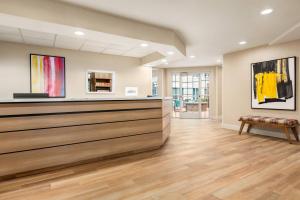 a lobby with a cash register in a building at Residence Inn by Marriott Roseville in Roseville