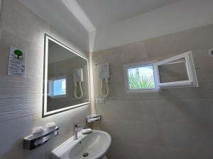 Hôtel Punta e Mare des Chambres ou des Appartements T2的一间浴室