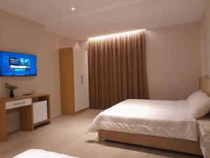 Postel nebo postele na pokoji v ubytování Solea Hotel