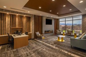 an office lobby with a view of a city at SpringHill Suites by Marriott Reno in Reno