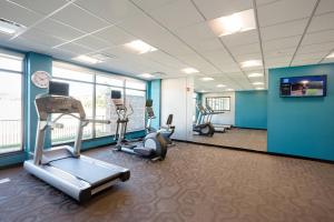 a gym with treadmills and ellipticals in a building at Fairfield Inn & Suites by Marriott Decorah in Decorah