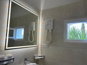 Hôtel Punta e Mare des Chambres ou des Appartements T2的一间浴室