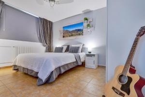 Posteľ alebo postele v izbe v ubytovaní Monda Heights close to Marbella