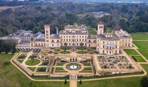 an aerial view of a large building with a garden at Ryde Beach Garden Apartment in Ryde