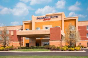a hospital building with a sign on it at SpringHill Suites Midland in Midland