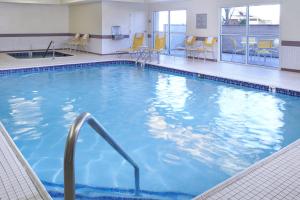 a large swimming pool in a hotel room at Fairfield Inn by Marriott Frankenmuth in Frankenmuth