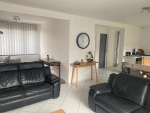 Posezení v ubytování Maison Bord de Mer + 11 fotografií